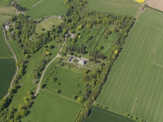 General oblique aerial view centred on the country house with the policies adjacent, taken from the SSE.