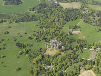 General oblique aerial view centred on the country house with the policies and gardens adjacent, taken from the  S.