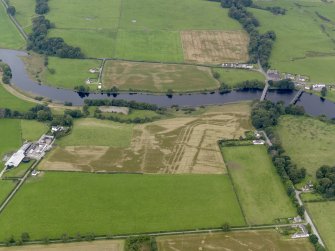 General oblique aerial view of the cropmarks of the Roman fort at Glenlochar, taken from the N.