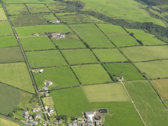 General oblique aerial view of the square patchwork field pattern, taken from the SW.