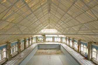 Interior view of pool hall showing elevated view from balcony, Skibo Castle.