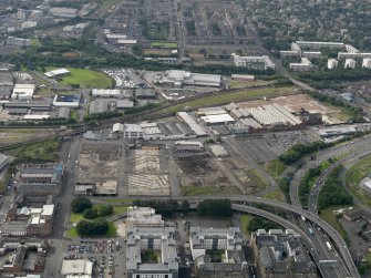 General oblique aerial view looking across the redevelopment of the works in the area of Scotland Street and Laidlaw Street, taken from the NNE.