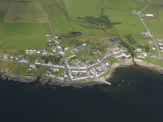Oblique aerial view of the village of Port Charlotte, taken from the ESE.