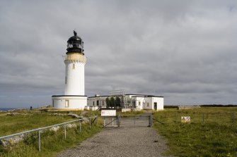 View from SSW of the lighthouse and the lighthouse keepers' cottages.