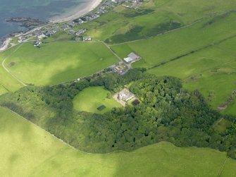 Oblique aerial view centred on Lossit House, taken from the SW.
