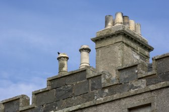 Detail of parapet and chimney stacks.