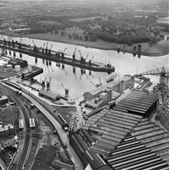 Glasgow, Clydebank, oblique aerial view centred on part of John Brown's shipyard with Clydebank Riverside Station adjacent, taken from the NW.