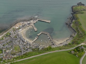Oblique aerial view centred on the harbour with the Shorehead adjacent, taken from the W.