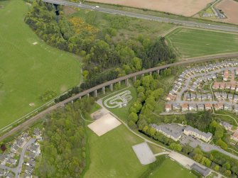 Oblique aerial view centred on the railway viaduct, taken from the SE.