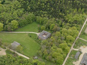 Oblique aerial view centred on the stable block, taken from the NE.