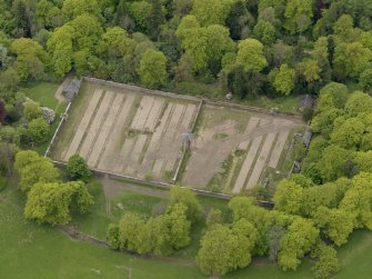 Oblique aerial view centred on the walled garden, taken from the NE.
