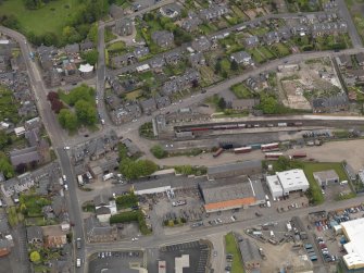 Oblique aerial view centred on the railway terminus, taken from the SSW.