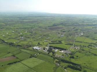 General oblique aerial view centred on the armament depot, taken from the NE.