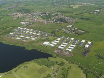 Oblique aerial view centred on the industrial estate, taken from the W.