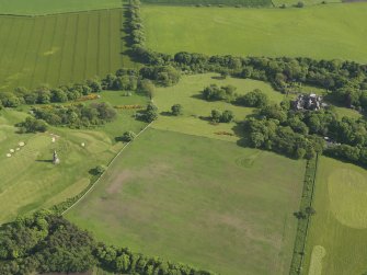 General oblique aerial view centred on the house with the policies adjacent, taken from the N.