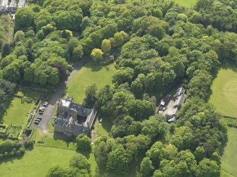 Oblique aerial view centred on the house with the terraced garden adjacent, taken from the ENE.