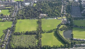 Oblique aerial view of Inverleith Park with the public allotments to the W, and the W gate of the Royal Botanic Gardens and the construction site of the new Biodiversity and Information Centre beyond, taken from the ESE.