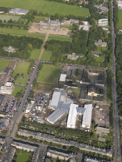 Oblique aerial view centred on Broughton High school and construction site of new school with Fettes College beyond, taken from the SSE.