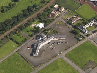 Oblique aerial view centred on Craigmillar primary school, taken from the SW.