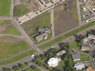 Oblique aerial view centred on Richmond Craigmillar Church, taken from the SW.