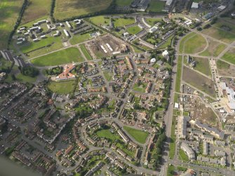 General oblique aerial view centred on Niddrie Mains Road and Niddrie Marischal estate, taken from the ESE.