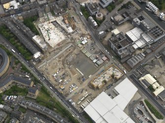 Oblique aerial view centred on the development site, taken from the NW.