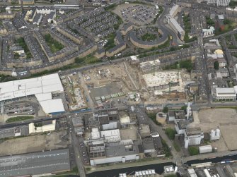 Oblique aerial view centred on the development site, taken from the  SSE.