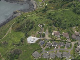 Oblique aerial view centred on the coast battery, taken from the NE.