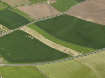 General oblique aerial view centred on the field boundaries, taken from the WNW.