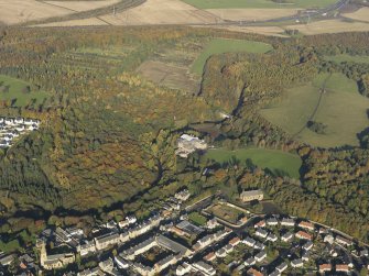 General oblique aerial view centered on Dalkeith Hosue and country park with St Mary's adjacent, taken from the S.