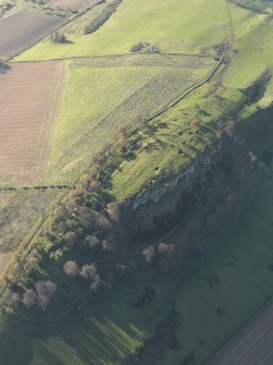 Oblique aerial view of the remains of the fort at Kae Heughs, Barney Mains, taken from the NE.