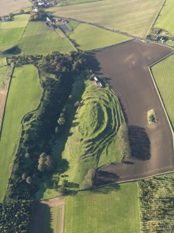 Oblique aerial view of the remains of the fort and settlement at The Chesters, Drem, taken from the E.