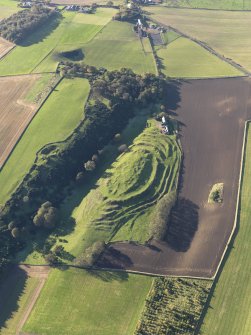 Oblique aerial view of the remains of the fort and settlement at The Chesters, Drem, taken from the ENE.