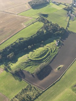 Oblique aerial view of the remains of the fort and settlement at The Chesters, Drem, taken from the NE.