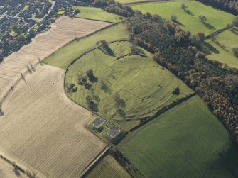 Oblique aerial view of the remains of the fort and redoubt at Duns Law, taken from the NE.