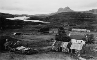 General view of Elphin showing Suilven in distance.