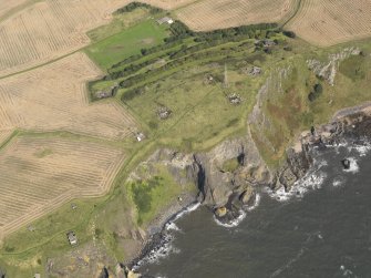 General oblique aerial view centred on the coast battery, taken from the SW.