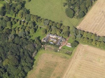 General oblique aerial view centred on the cottages, taken from the SSE.