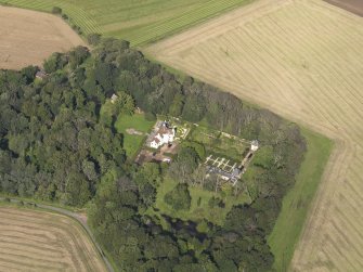 Oblique aerial view centred on the House with the gardens adjacent , taken from the SSE.