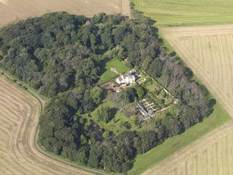 Oblique aerial view centred on the House with the gardens adjacent , taken from the SE.