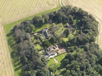 Oblique aerial view centred on the House with the gardens adjacent , taken from the SW.
