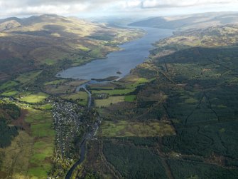 General oblique aerial view centred on the village with Loch Tay beyond, taken from the SW.