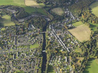 Oblique aerial view centred on Drummond Street with the town adjacent, taken from the ENE.