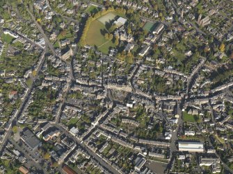 Oblique aerial view centred on the High Street with King Street adjacent, taken from the S.