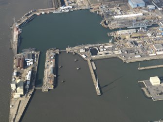 Oblique aerial view centred on the dockyard, taken from the  ESE.
