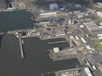 Oblique aerial view centred on the dockyard, taken from the  ESE.