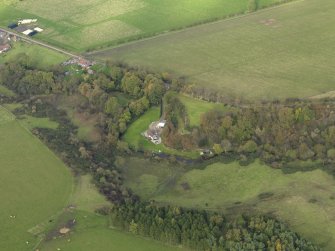 Oblique aerial view centred on the cottage, taken from the SW.