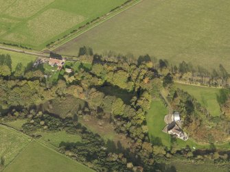 Oblique aerial view centred on the cottages, taken from the WSW.