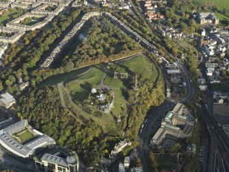 Oblique aerial view centred on the Calton Hill with St Andrew's House adjacent, taken from the W.