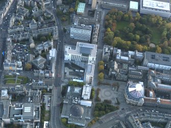 Oblique aerial view centred on the University Information Centre with the McEwan Hall adajacent, taken from the NNW.